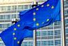 EU flags in front of European Commission in Brussels