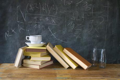 books, cup of coffee, black board, education, learning ,science concept