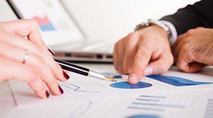 stock hands and graphs