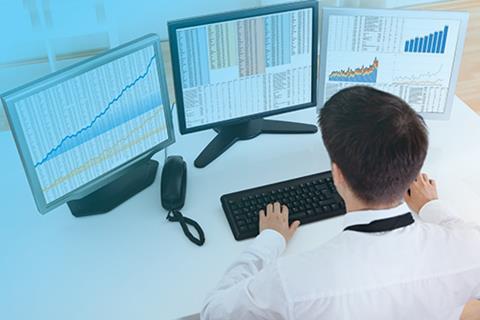 Computer screens of a stock broker 125059073 copy