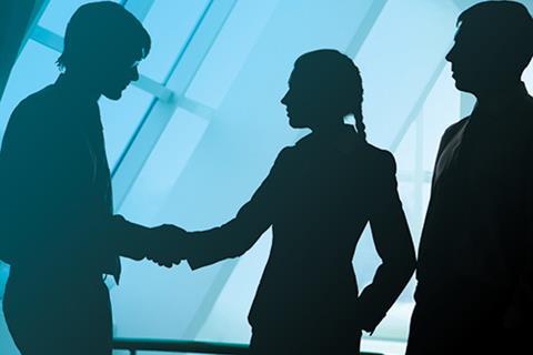 Businesspeople handshaking 24650392 copy