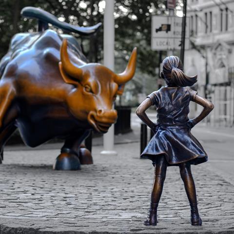 The Fearless Girl statue facing Charging Bull in Lower Manhattan, New York City